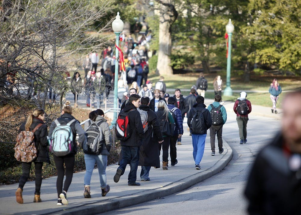 <p>IU students walk on campus in between classes. IU-Bloomington was the only campus with increased enrollment this semester - enrollment decreased at all regional IU campuses. </p>