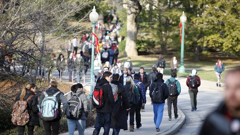 IU students walk on campus in between classes. IU-Bloomington was the only campus with increased enrollment this semester - enrollment decreased at all regional IU campuses. 