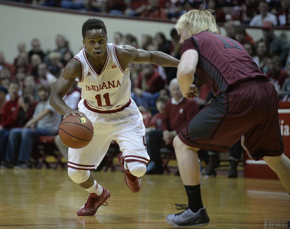 Junior guard Kevin "Yogi" Ferrell drives the lane during IU's game against Indianapolis on Monday at Assembly Hall.