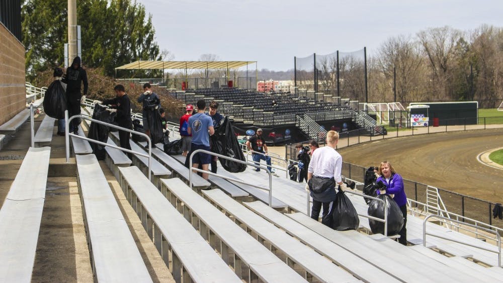 Students who received a drinking violation ticket over the Little 500 weekend clean up trash Sunday afternoon at Bill Armstrong Stadium as part of the pretrial diversion program. This year's number of drinking tickets was especially low.&nbsp;
