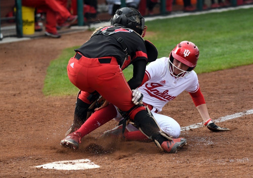 <p>Then-freshman outfielder Taylor Lambert gets tagged out at the plate April 18, 2018. IU softball went 3-3 for the weekend, losing three games to Northwestern and winning three games against Rutgers, in Leesburg, Florida. </p>