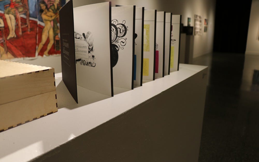 Senior Ashley&nbsp;VanArsdale's piece "History of Typography and Transport" resembles an accordion book. Although it required a lot of time and effort, the artist said it was her favorite personal piece in this year's gallery.