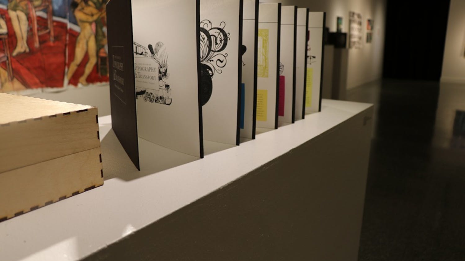 Senior Ashley VanArsdale's piece "History of Typography and Transport" resembles an accordion book. Although it required a lot of time and effort, the artist said it was her favorite personal piece in this year's gallery.