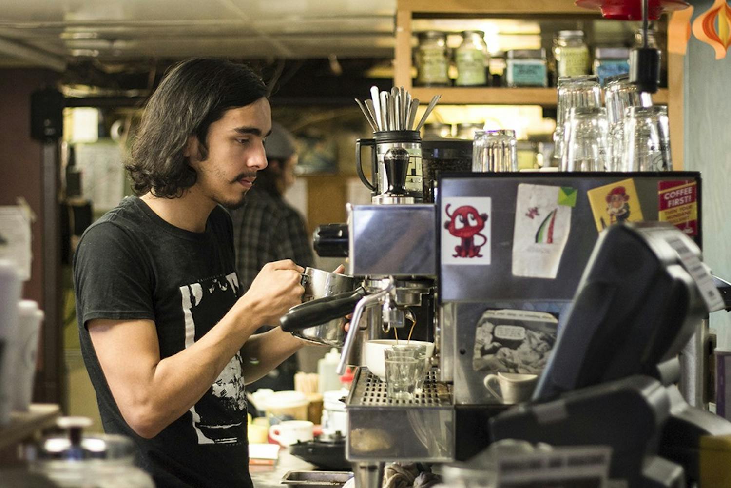 Soma win the best coffee in Blooington this year.  Steven Garicia makes a latte. 
