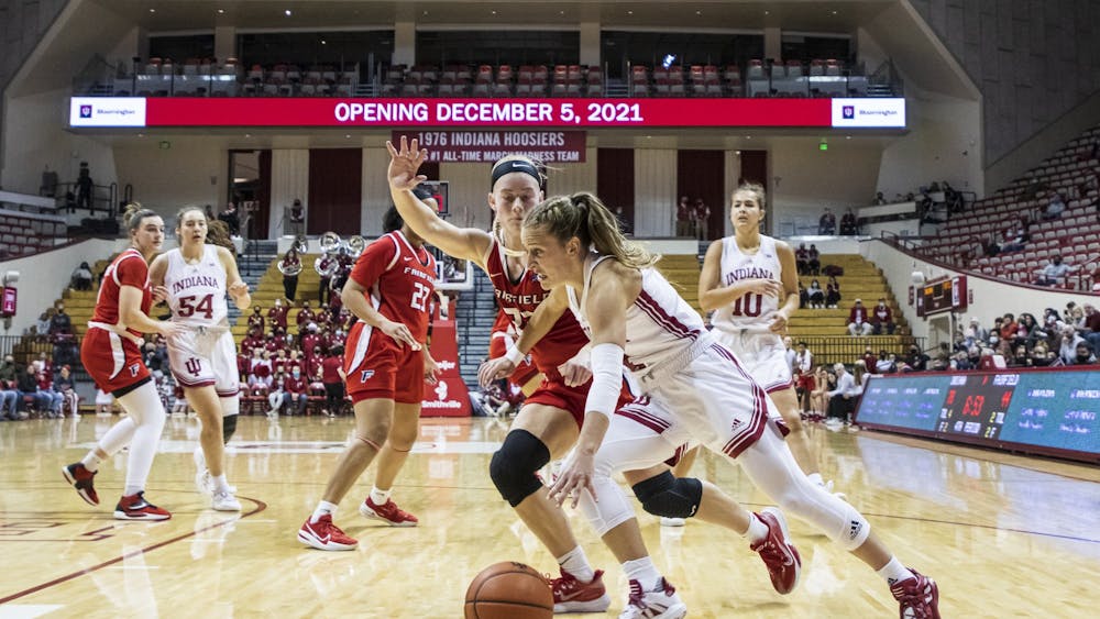 Graduate guard Nicole Cardaño-Hillary drives by a defender on Dec. 9, 2021, at Simon Sjkodt Assembly Hall. No. 5 Indiana fell to No. 6 Michigan 65-50 on Jan. 31, 2022, in Ann Arbor, Michigan.