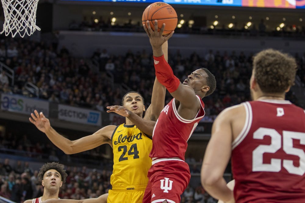<p>Then-senior guard Xavier Johnson goes for a layup against Iowa on March 12, 2022, at Gainbridge Fieldhouse. Johnson was arrested and preliminarily charged with resisting law enforcement and reckless driving after he was pulled over for driving 90 mph in April on North Walnut Street.</p>
