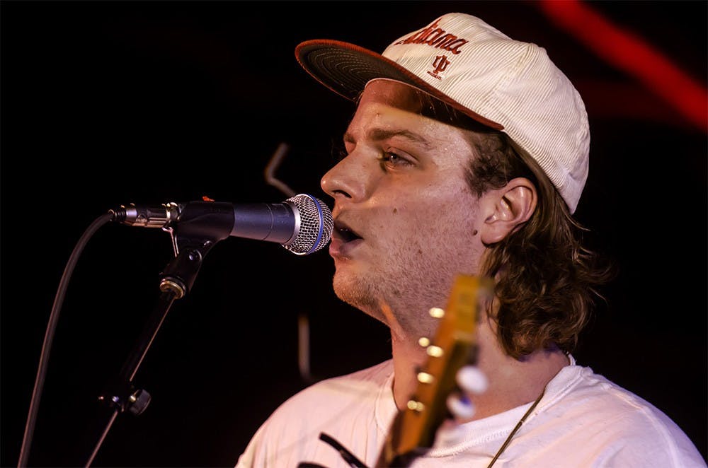 Headliner Mac DeMarco strums a track from his latest album during the Culture Shock music festival in Dunn Meadow on April 12, 2014. Culture Shock 2014 was presented by WIUX student radio and BCEC.  