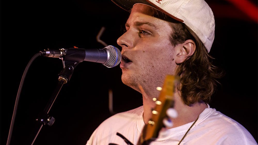 Headliner Mac DeMarco strums a track from his latest album during the Culture Shock music festival in Dunn Meadow on April 12, 2014. Culture Shock 2014 was presented by WIUX student radio and BCEC.  