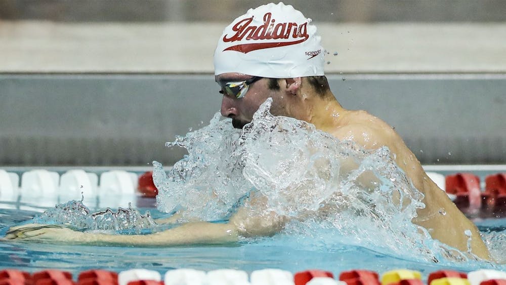 <p>Then-senior Brock Brown competes during the 2021 Big Ten Championships on March 6 at the McCorkle Aquatic Pavilion. Indiana swim and dive defeated Purdue on Saturday at the Morgan J. Burke Aquatic Center in West Lafayette.</p>