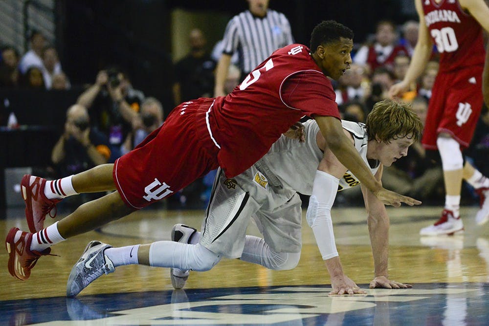 Sophomore forward Troy Williams dives for a loose ball during IU's game against Wichita State on Friday at CenturyLink Center in Omaha, Neb.