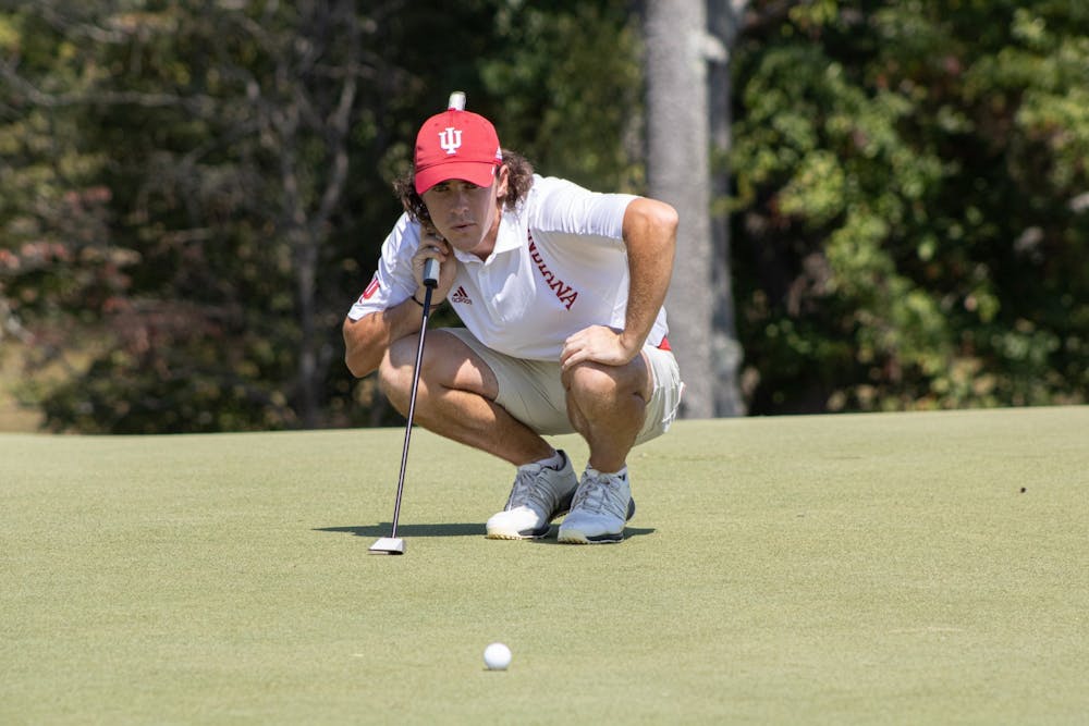 <p>Sophomore Clay Merchent prepares for his putt during the Hoosier Collegiate Invite on Sept. 6, 2021, at Pfau Golf Course in Bloomington. Indiana will play in the Big Ten Tournament on Feb. 4 and Feb. 5 in Hammock Beach, Florida.  </p>