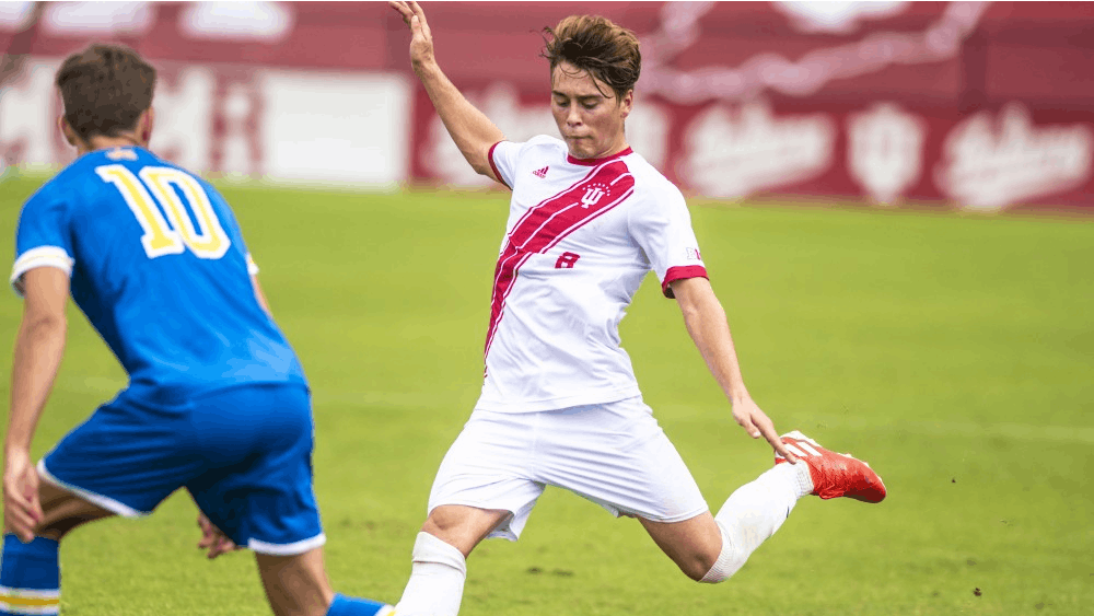 Freshman Aidan Morris plays a long ball during IU’s 2-1 win over the University of California at Los Angeles on Sept. 2 at Bill Armstrong Stadium. IU men&#x27;s soccer travels to South Bend, Indiana, to take on the University of Denver at 4 p.m. Friday night before returning at 4 p.m. Sunday to clash with Seattle University.