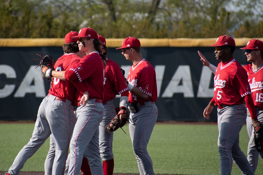 <p>Players celebrate April 25, 2023 after winning 9-8 against Ball State University at First Merchant Ball Park Complex in Muncie, Indiana. Indiana swept Purdue in three games at Bart Kaufman Field over the weekend, May 14. </p>
