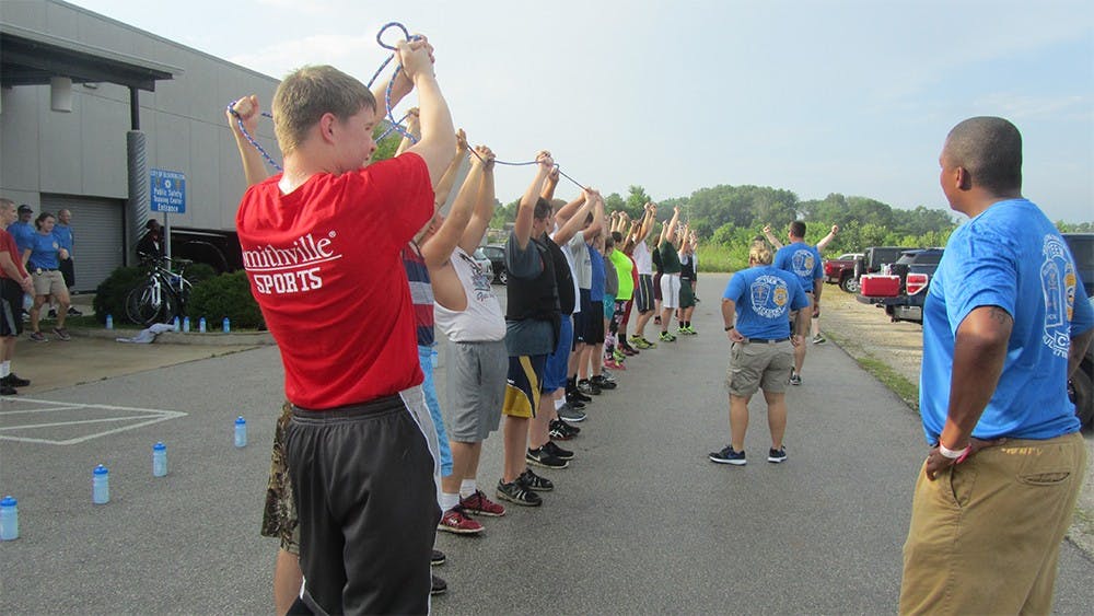 Teenagers do morning drills Wednesday at Bloomington's first Teen Police Academy.
