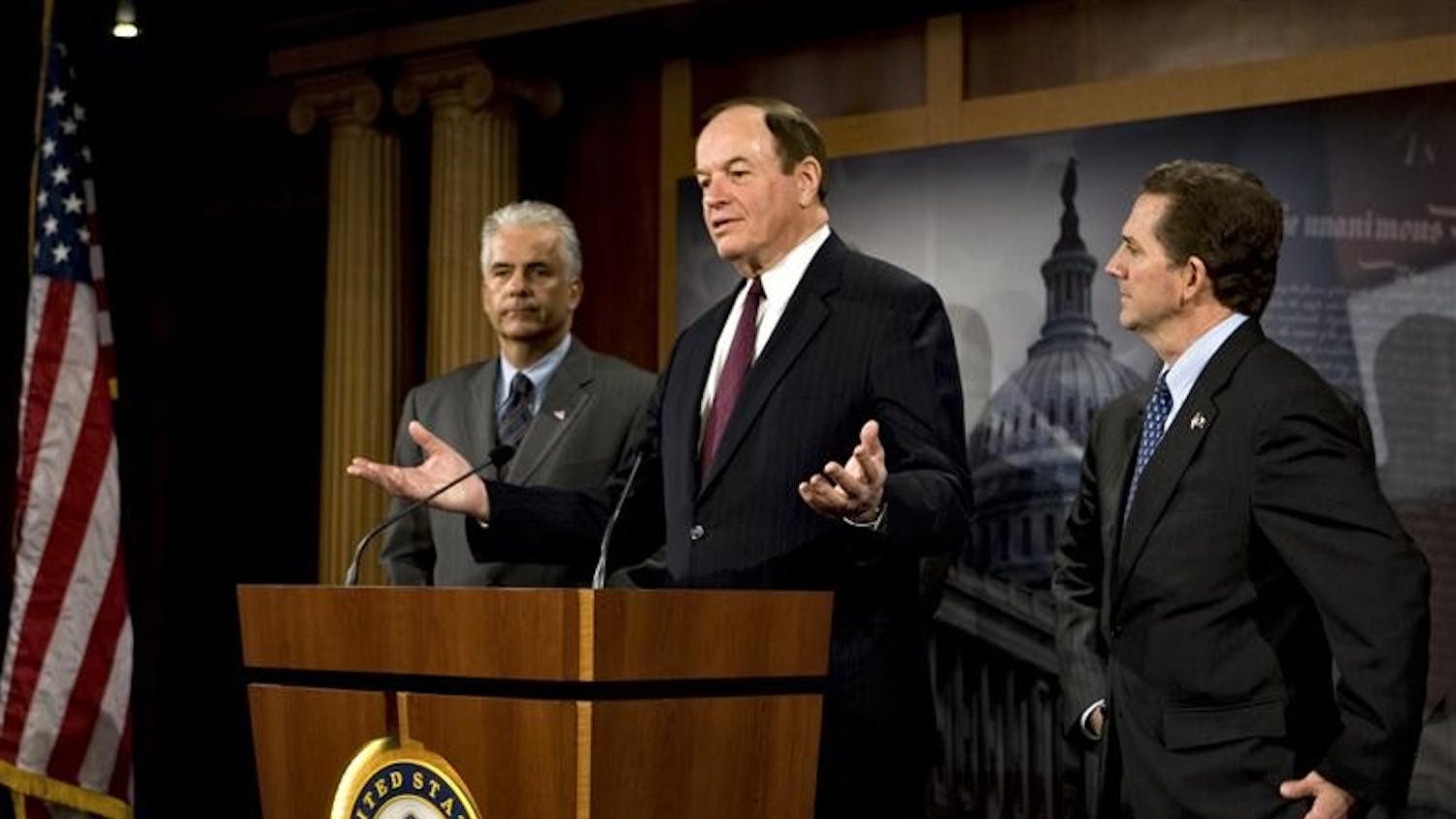 Sen. Richard Shelby, R-Ala., center, flanked by Sen. John Ensign, R-Nev., and Sen. Jim DeMint, R-S.C., talks to reporters on Capitol Hill on Wednesday in Washington about Republican opposition to American automakers getting a financial deal from the White House and Democrats in Congress. 