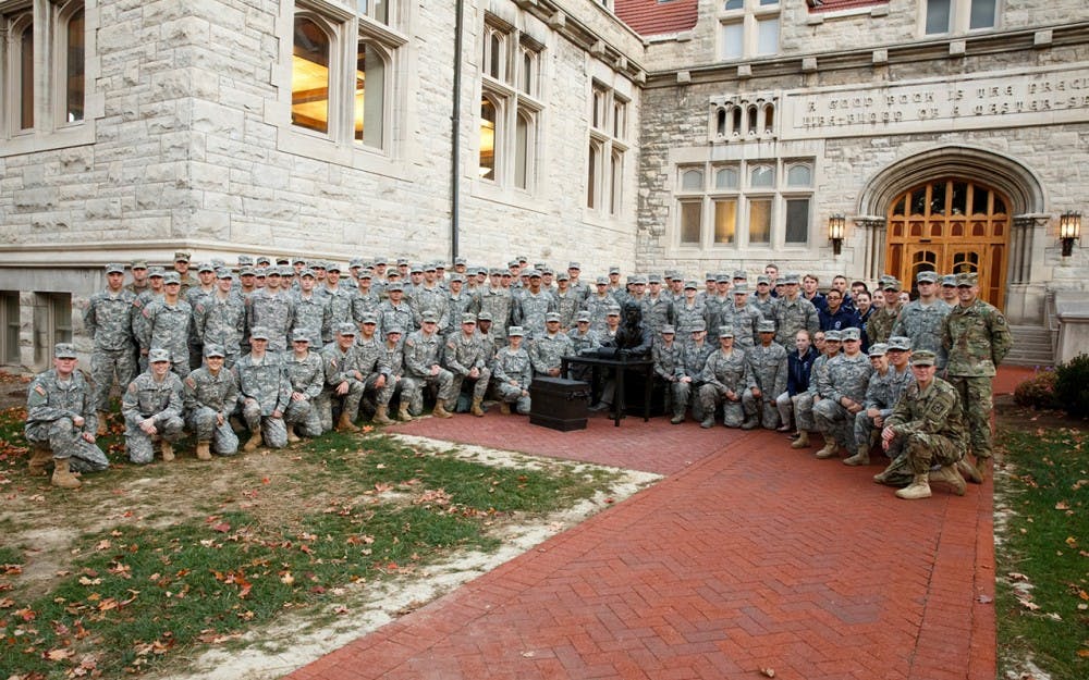 IU ROTC cadets stand outside of Franklin Hall during a Veterans Day flag-raising ceremony. This event took place on the IU Bloomington campus.