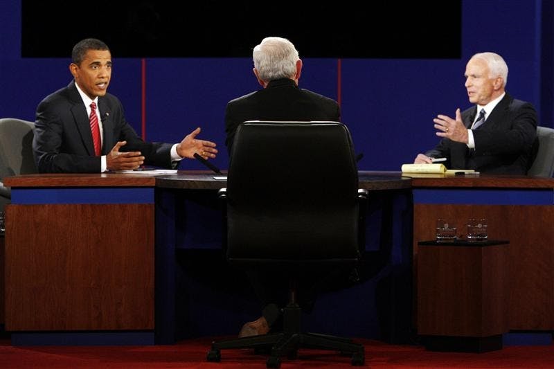 Democratic presidential candidate Sen. Barack Obama, D-Ill., and Republican presidential candidate Sen. John McCain, R-Ariz., trade responses during a presidential debate on Wednesday at Hofstra University in Hempstead, N.Y.