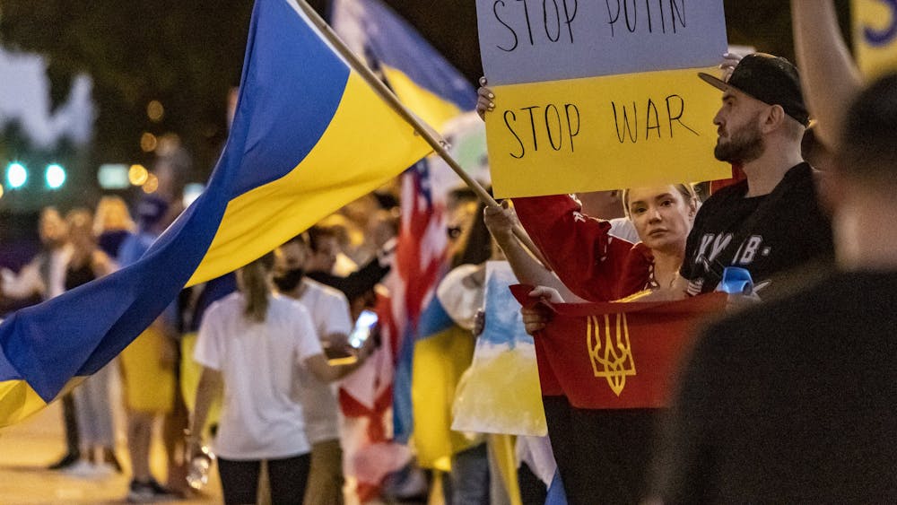Members of the Ukrainian and Russian communities in South Florida gather in front of Hallandale Beach City Hall in support of Ukraine after Russian forces invaded the country earlier in the day, Feb. 24, 2022, in Hallandale Beach, Florida. IU lecturer Svitlana Melnyk said Ukraine is a sovereign, democratic country with the right to choose its own government and values.