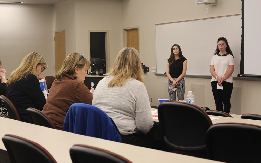 Brynn Edelcup and Corinne Levy present their case to the judges of IU's Human Resource Association's first annual case competition. Students must identify issues in a mock case and provide possible solutions to them.