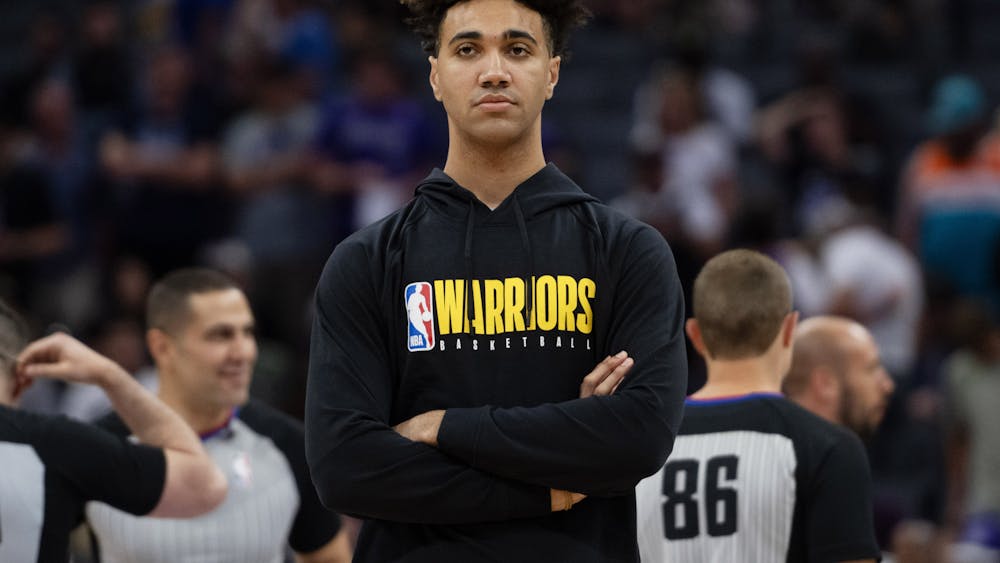 Golden State Warriors' Trayce Jackson-Davis (32) stands on the court before their game during the 2023 California Classic at Golden 1 Center in Sacramento, Calif., on Monday, July 3, 2023.