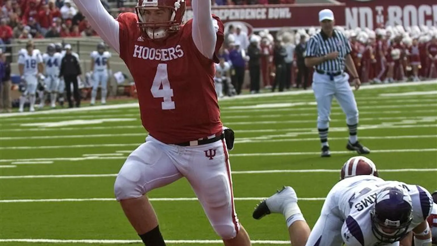 Sophomore quarterback Ben Chappell runs for a touchdown against Northwestern Saturday at Memorial Stadium. The Hoosiers defeated the Wildcats 21-19, ending a five game losing streak.