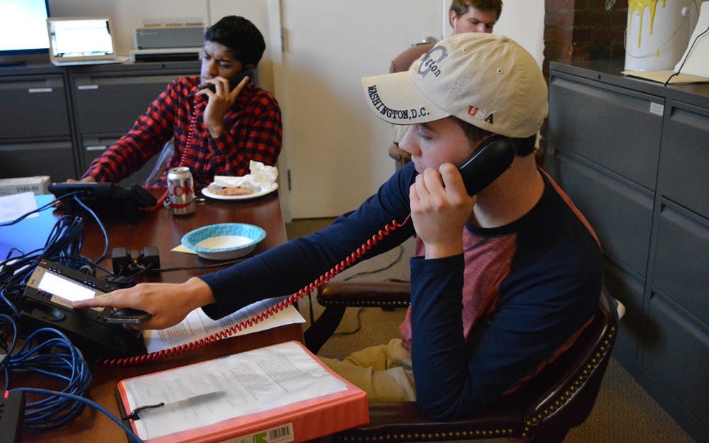 Sophomore Justin Sexton (right) Kyle Cheverko (left), members of College Republicans at IU make phone calls on behalf of Trey Hollingsworth. This was a part of the a competition against the College Republicans of Purdue.