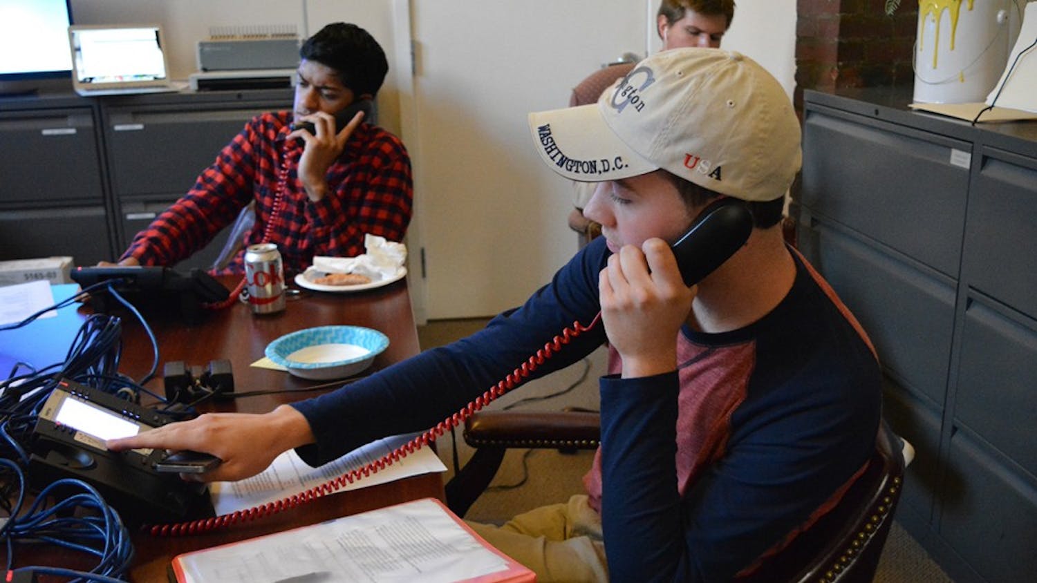 Sophomore Justin Sexton (right) Kyle Cheverko (left), members of College Republicans at IU make phone calls on behalf of Trey Hollingsworth. This was a part of the a competition against the College Republicans of Purdue.