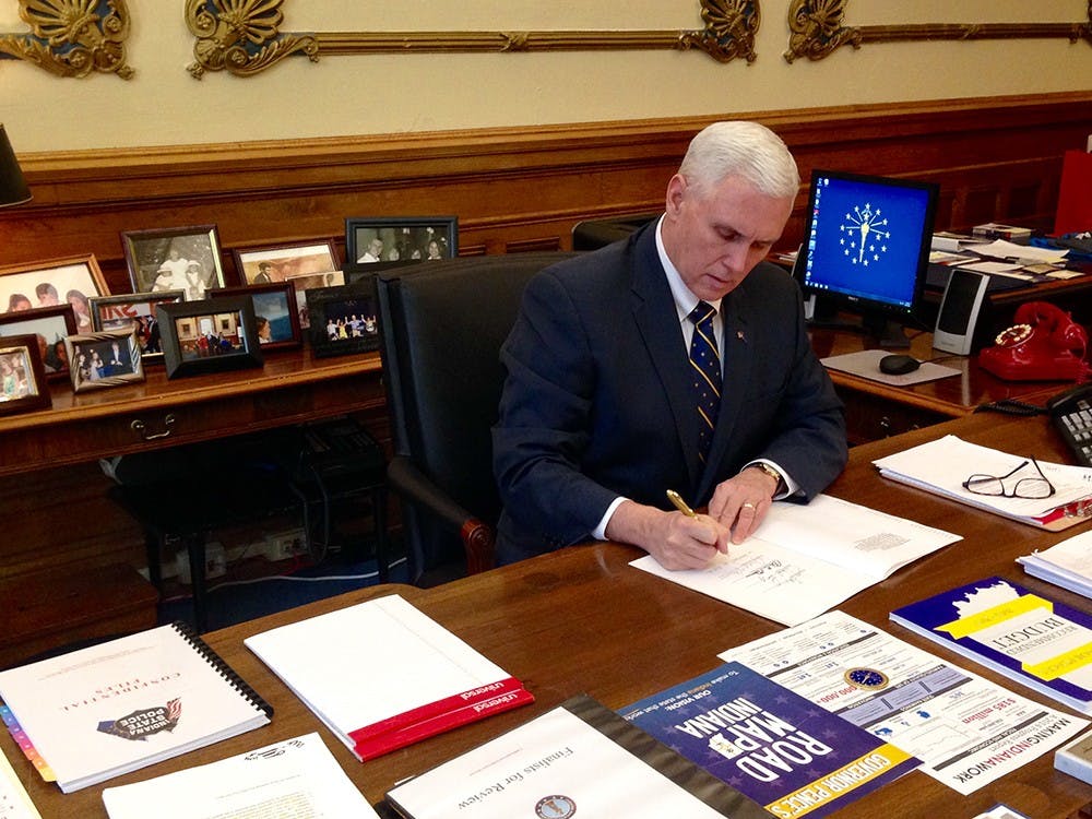 Governor Mike Pence signs into law SEA 62, a bill which will shorten this year's ISTEP test. The bill passed unanimously in both houses.