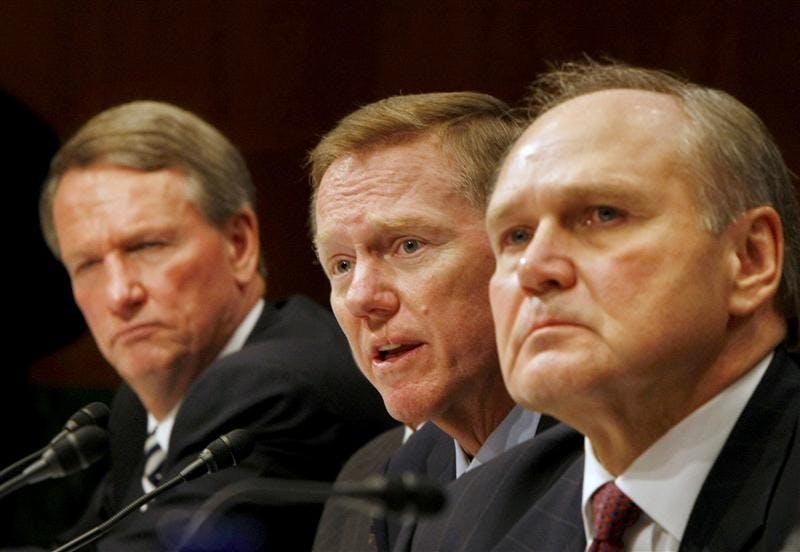 Ford Chief Executive Officer Alan Mulally, center, flanked by General Motors Chief Executive Officer Richard Wagoner, left, and Chrysler Chief Executive Officer Robert Nardelli, testifies Wednesday on Capitol Hill before a Senate Banking Committee hearing on a proposed auto industry bailout.