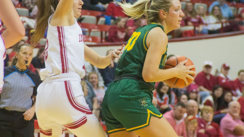 A University of Vermont player is blocked by Freshman guard Yarden Garzon Nov. 8, 2022, at Simon Skjodt Assembly Hall. The Hoosiers claimed a 74-62 overtime win against Nebraska on Jan. 1, 2023.
