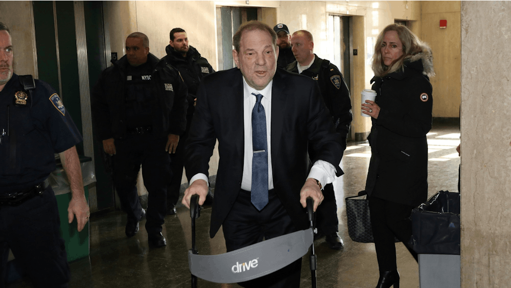 Harvey Weinstein arrives Feb. 21 on the 15th floor of Manhattan Criminal Court in New York. Jury deliberations in Weinstein&#x27;s rape trial entered a fourth day Feb. 21. 