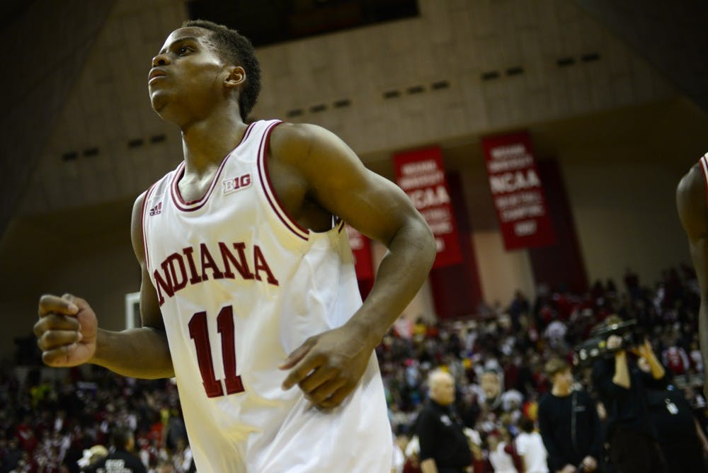 Junior guard Kevin "Yogi" Ferrell walks off the court after losing to Michigan State, 74-72, on Saturday at Assembly Hall. Ferrell missed a crucial free-throw to tie the game in the final seconds of the game.