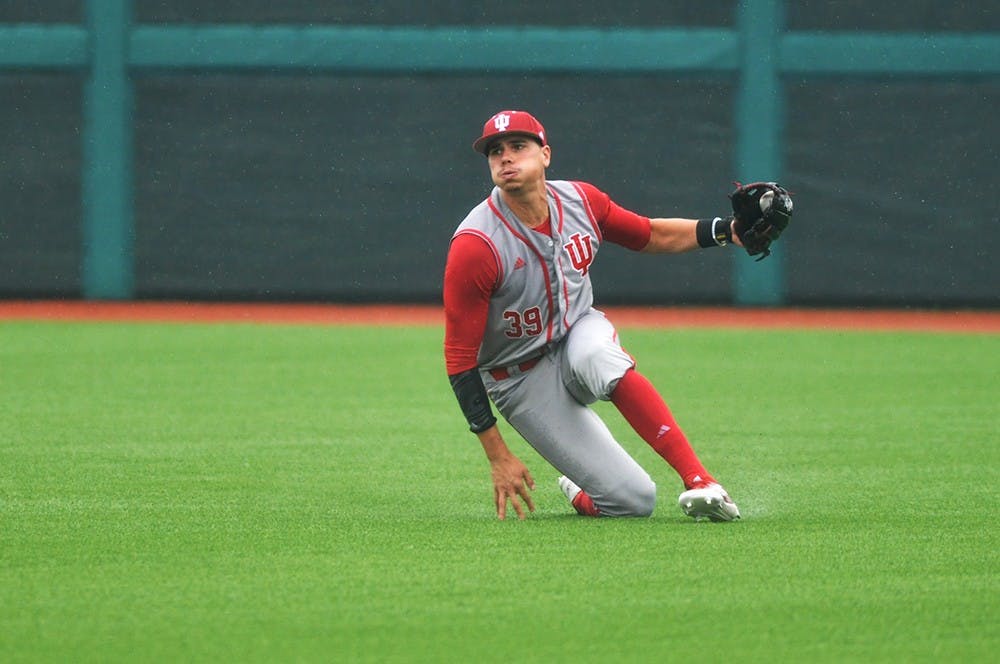 Senior outfielder Craig Dedelow jumps to his feet after a diving catch in right field against Minnesota on May 24, 2017 at Bart Kaufman Field. Dedelow was selected in the 9th round of the MLB draft by the Chicago White Sox.