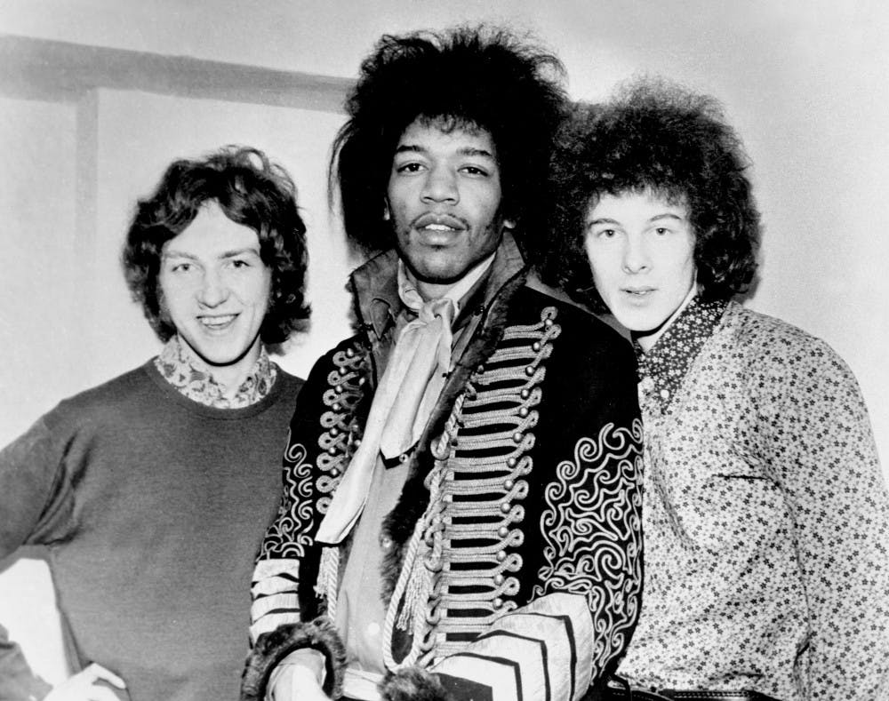 <p>Guitarist and singer, Jimi Hendrix with Mitch Mitchell, left, and Noel Redding, right.</p>