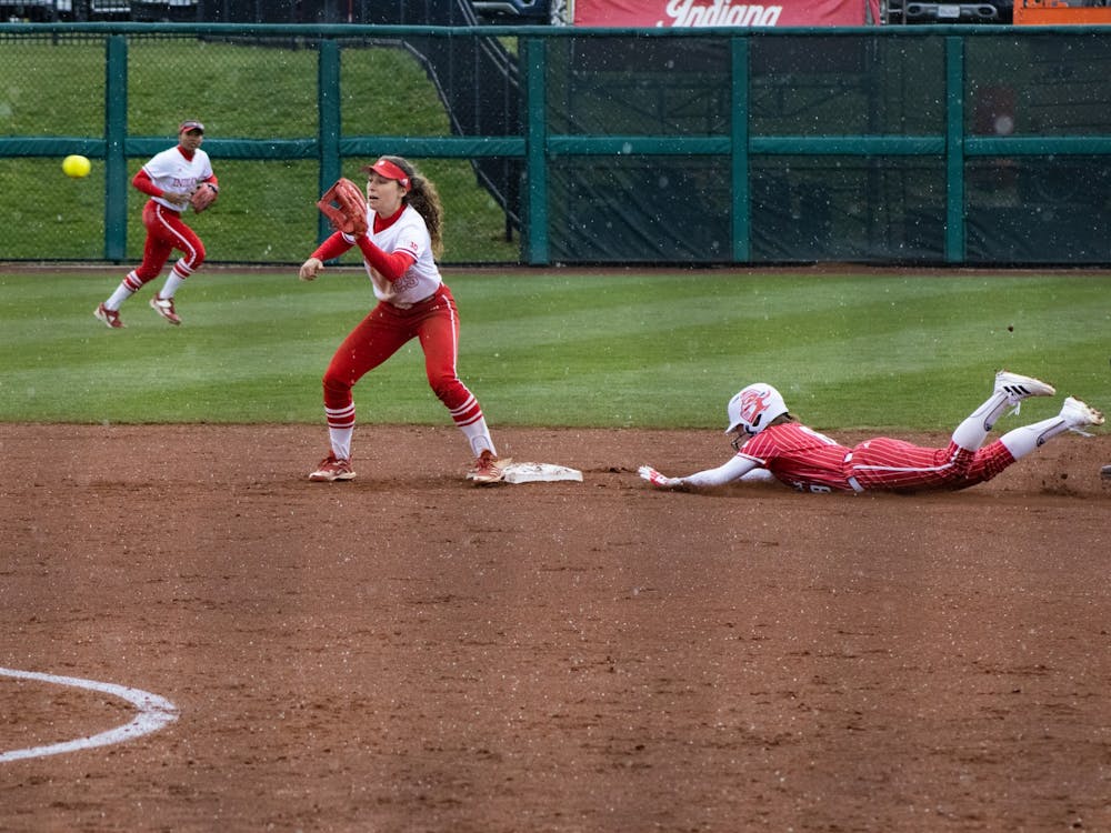 Junior infielder, Cora Bassett, catches the ball on a steal attempt vs Rutgers April 8, 2022. IU went 3-1 in the NFCA Leadoff Classic this weekend.