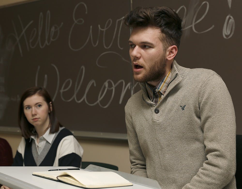 Trenton Dunham, right, student advocacy chair of the Residence Hall Association, asks participants when they felt insecurity on the campus and residence hall Monday at Ashton Griggs 101B. The organization hosted to discuss about safety issues on the campus and improve them. 