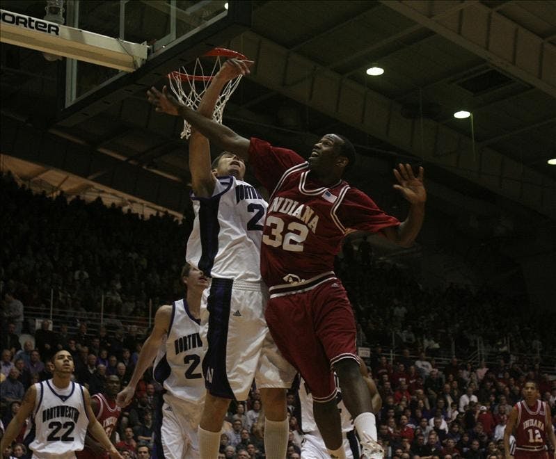 IU's Broderick Lewis is fouled going for a layup in the first half of Wednesday's game between the Hoosiers and Northwestern at Welsh-Ryan Arena in Evanston, Ill.