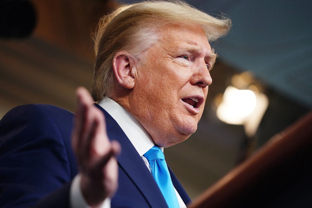 President Donald Trump, joined by members of the Coronavirus Task Force, delivers remarks on the coronavirus pandemic April 7 in the James S. Brady Press Briefing Room of the White House in Washington, D.C. Trump has made remarks encouraging the Big Ten to reverse the decision to postpone the college football season, including a meeting with Big Ten Commissioner Kevin Warren.