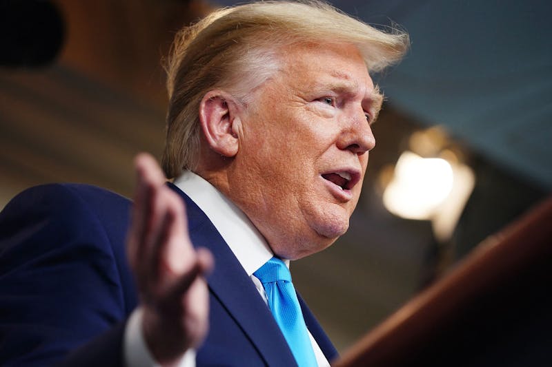 President Donald Trump, joined by members of the Coronavirus Task Force, delivers remarks on the coronavirus pandemic April 7 in the James S. Brady Press Briefing Room of the White House in Washington, D.C. Trump has made remarks encouraging the Big Ten to reverse the decision to postpone the college football season, including a meeting with Big Ten Commissioner Kevin Warren.