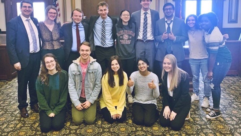 The Mock Trial at IU members pose for a photo March 8 in the Hamilton County Courthouse in Cincinnati, Ohio. The team was competing at the Opening Round Championship Series, their last tournament before the COVID-19 pandemic canceled the season.