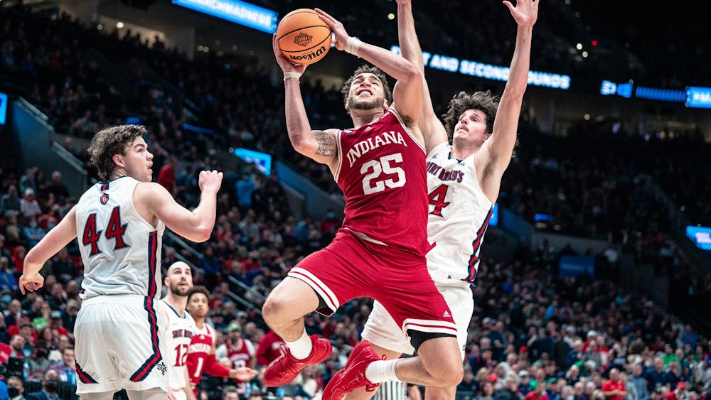 Then-senior forward Race Thompson attempts a layup March 17, 2022, at the Moda Center in Portland, Oregon. The 2022-2023 basketball season is shaping up to be one for the books for both the men’s and women’s teams.