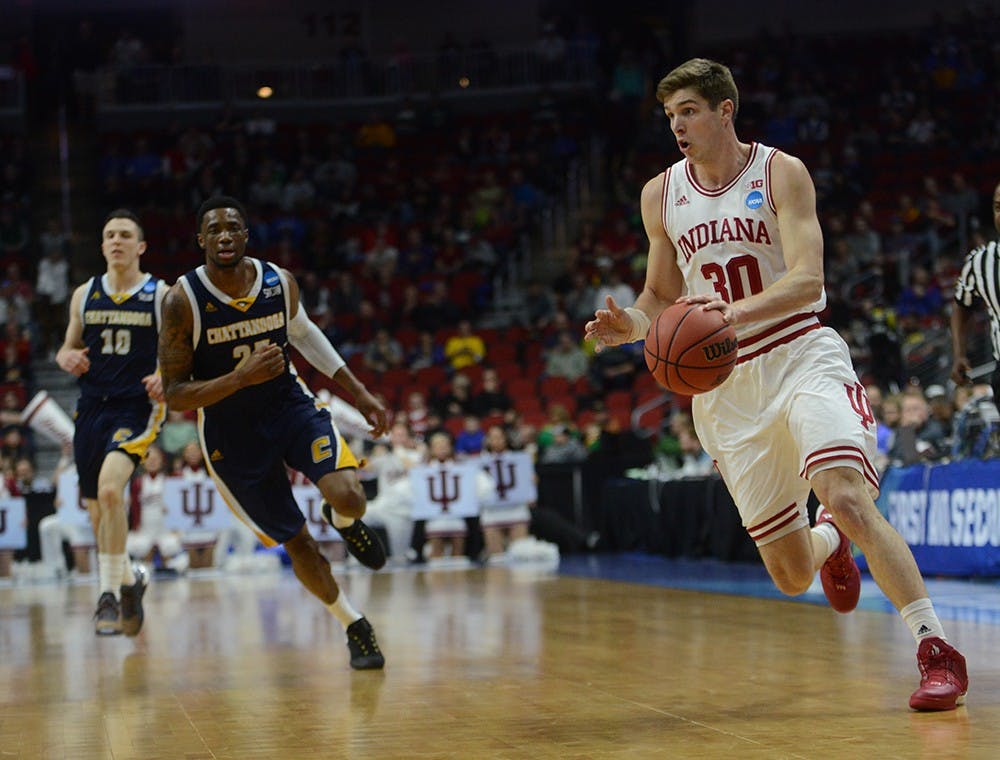 Junior forward Collin Hartman drives to the basket during the NCAA Tournament game against Chattanooga on Thursday at the Wells Fargo Arena in Des Moines, Iowa. The Hoosiers won 99-74.