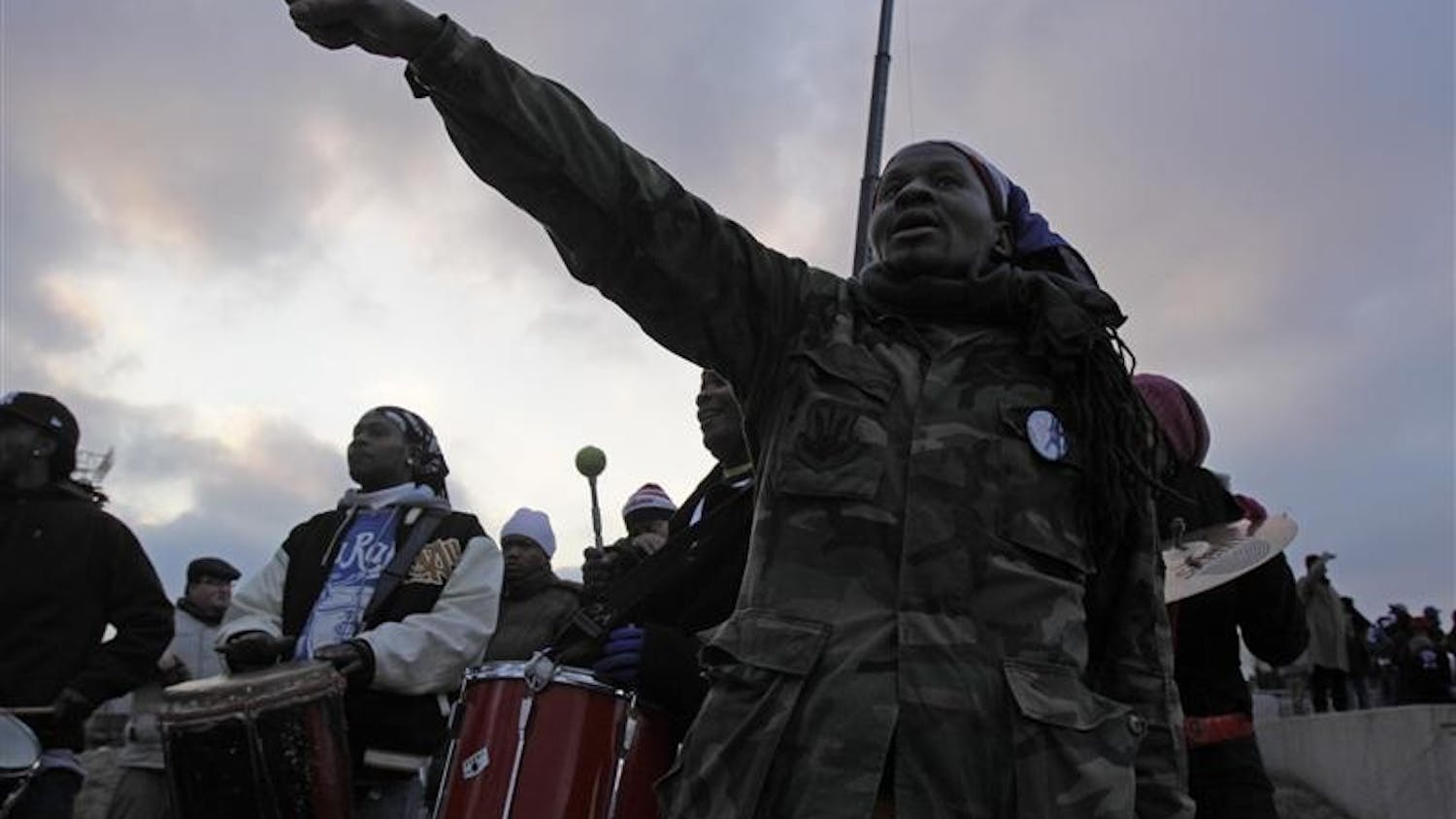 Yves Bien-aine, along with DJARARA, a band from Brooklyn, NY that plays Haitian Rara music, perform Monday in front of the Lincoln Memorial. DJARARA's music celebrated black freedom and drew the attention of many onlookers present to see the site of Martin Luther King Jr.'s "I Have a Dream" speech.