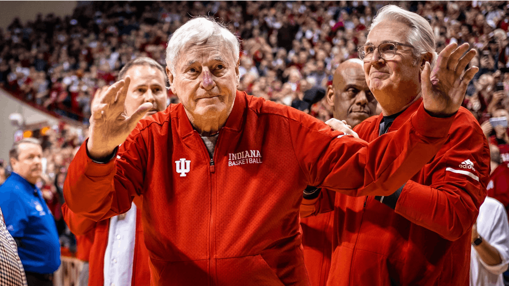 Former IU men&#x27;s basketball coach Bob Knight waves at fans Feb. 8, 2020, at Simon Skjodt Assembly Hall. Knight was hospitalized March 31, 2023.
