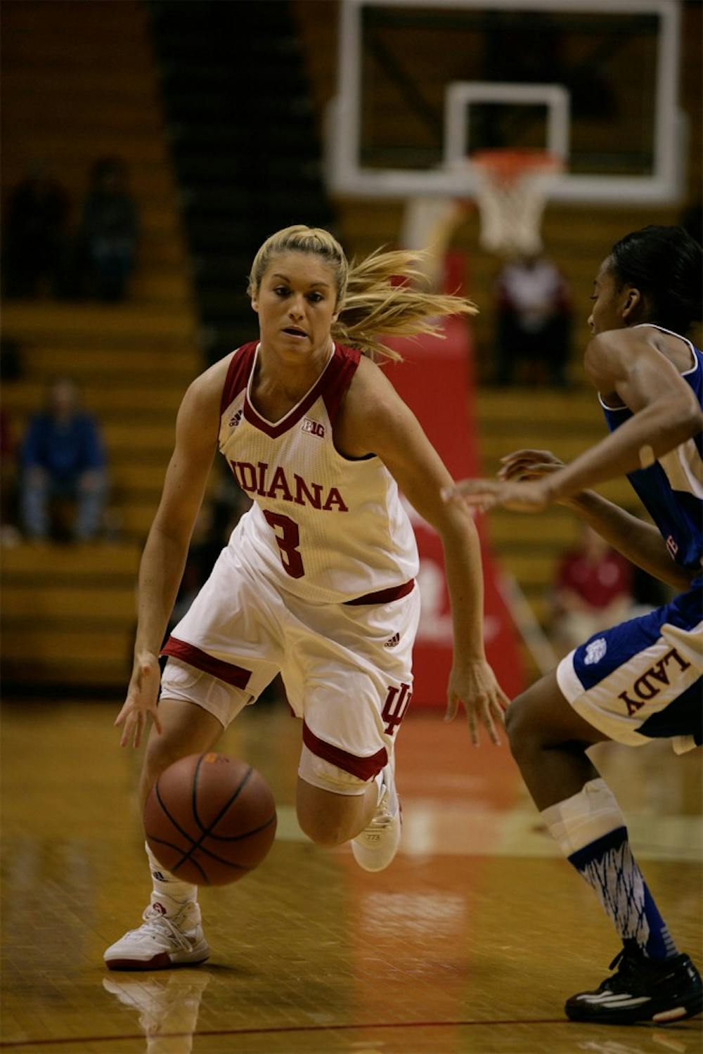 Sophomore guard Tyra Buss runs the ball down the court during the game against Tennessee State on Friday at Assembly Hall. Buss led the Hoosiers in scoring, putting up 21 points while also having 8 assists.