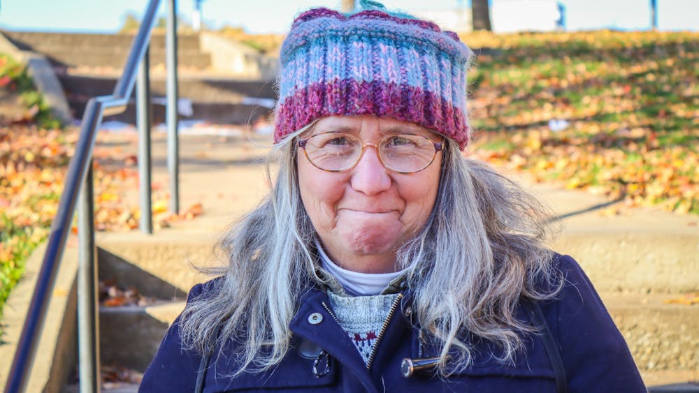 Heather Lake poses Nov. 6, 2021, in Seminary Square Park in Bloomington. Lake has been serving coffee and food to people experiencing homelessness for a year and a half. &quot;I just want to make it sort of a special thing and keep people warm,&quot; Heather said. 