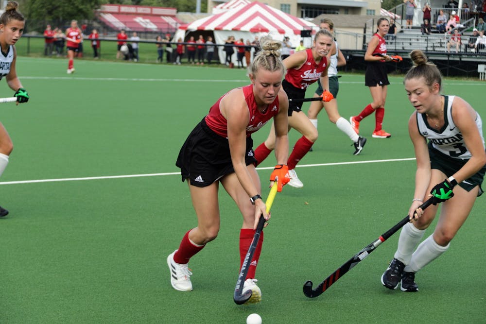 <p>Sophomore midfielder Anna Gwiazdzinski runs with the ball during a match against Michigan State University on Oct. 15, 2021, at the IU Field Hockey Complex. Indiana will face No. 6 Northwestern on Oct. 31, 2021, in Evanston, Illinois.</p>