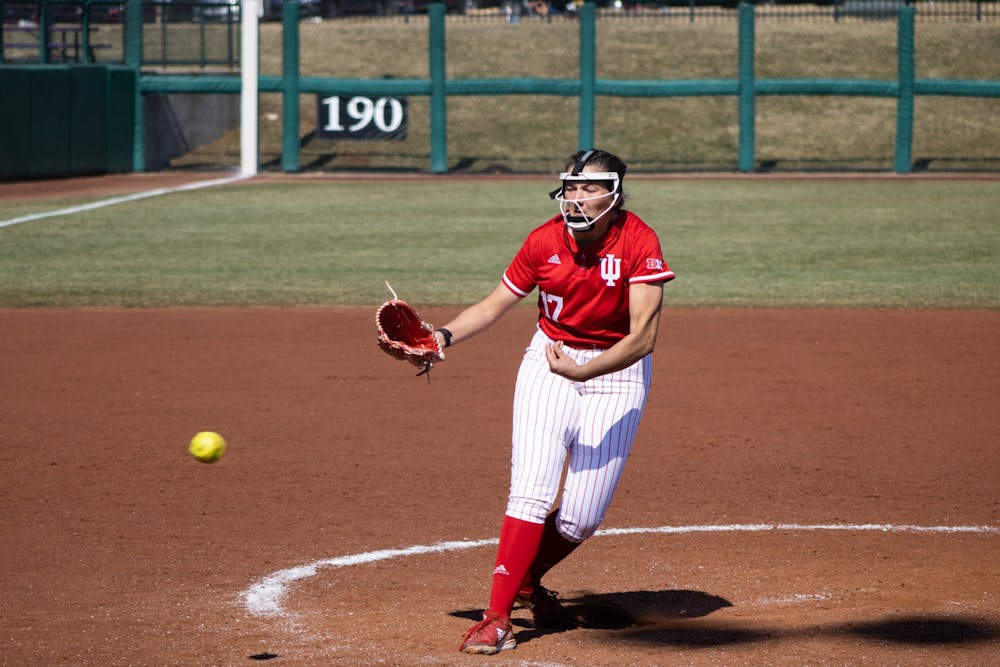 <p>Freshman pitcher Heather Johnson throws a pitch against Western Illinois University on March 5, 2022. Indiana had three wins and one loss over the weekend.</p>