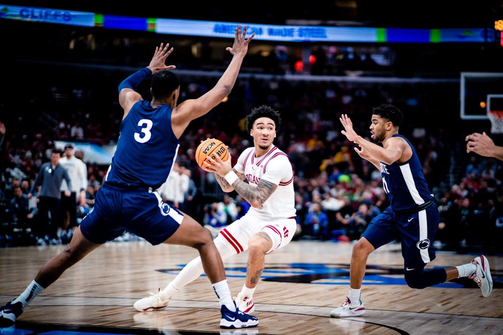 <p>Freshman guard Jalen Hood-Schifino looks to pass the ball March 11, 2023, at the United Center in Chicago. Indiana will be a No. 4 seed in the NCAA Tournament.</p>