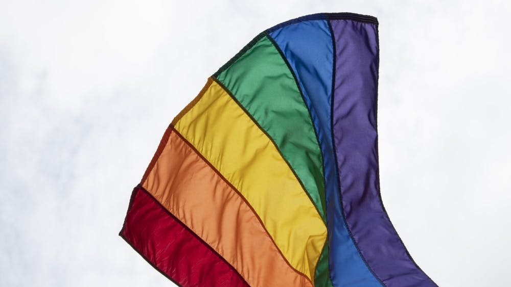 A rainbow flag waves in the wind June 8 at Indy Pride in Indianapolis. Indiana senators passed an amended version of House Bill 1608 out of committee in a 9-4 vote March 22, 2023.  